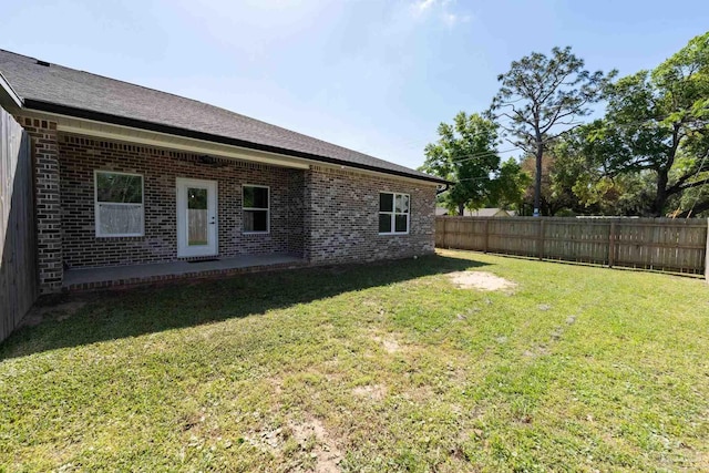 9901 Raymar St Unit A, Pensacola, FL 32534 - view of yard featuring a patio and fence