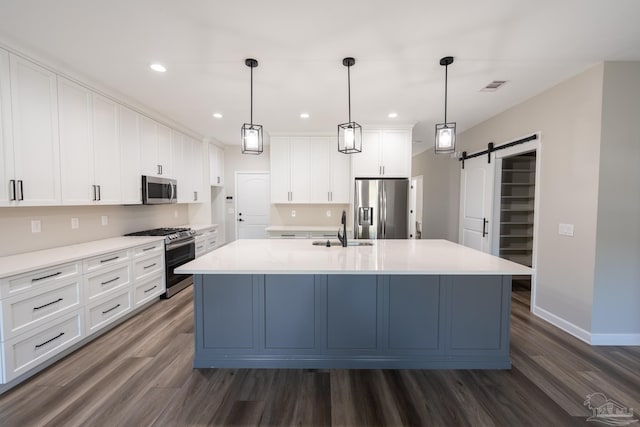 9901 Raymar St Unit A, Pensacola, FL 32534 - kitchen with a sink, visible vents, appliances with stainless steel finishes, and dark wood-style floors