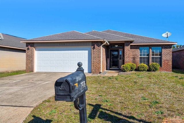 ranch-style home featuring a garage, a front yard, brick siding, and driveway