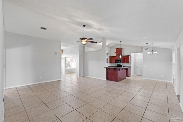 unfurnished living room featuring lofted ceiling, visible vents, light tile patterned flooring, a textured ceiling, and ceiling fan with notable chandelier