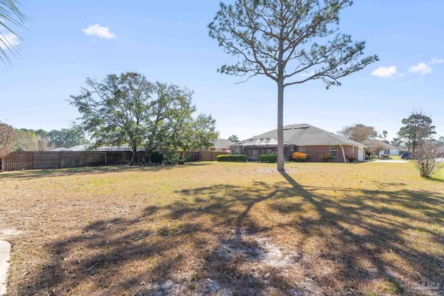 view of yard with a fenced backyard