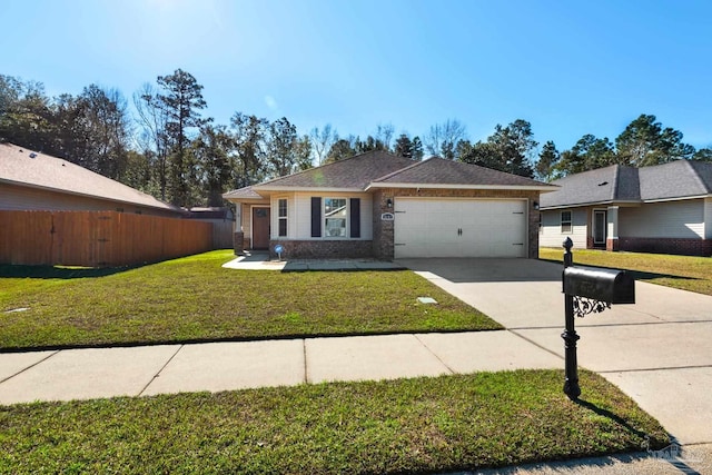 view of front of home featuring a garage, driveway, a front lawn, and fence