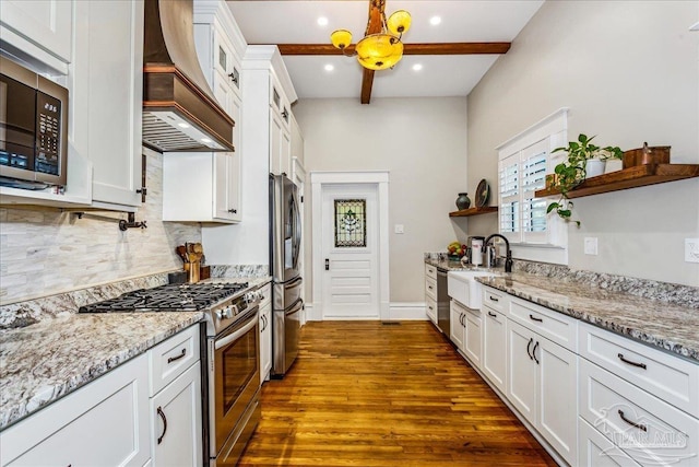 kitchen with premium range hood, white cabinetry, dark hardwood / wood-style floors, beamed ceiling, and stainless steel appliances