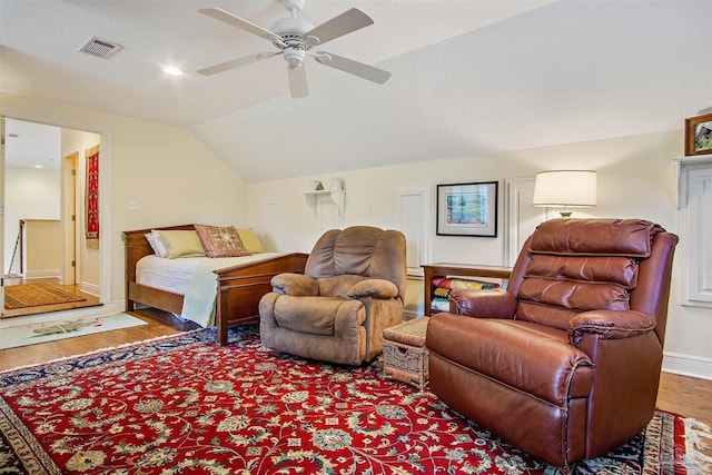 607 Goodwill Cir, Silas, AL 36919 - bedroom with wood finished floors, lofted ceiling, baseboards, and ceiling fan