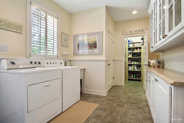 607 Goodwill Cir, Silas, AL 36919 - laundry room with cabinet space, washer and dryer, wainscoting, and recessed lighting