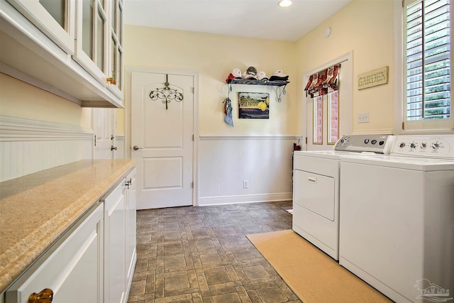 607 Goodwill Cir, Silas, AL 36919 - laundry room featuring cabinet space, washing machine and dryer, a wainscoted wall, and recessed lighting