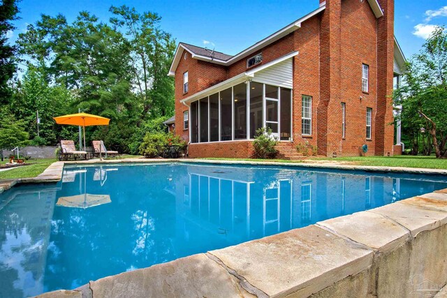 607 Goodwill Cir, Silas, AL 36919 - outdoor pool with a sunroom