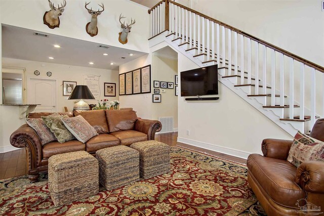 607 Goodwill Cir, Silas, AL 36919 - living area with wood finished floors, baseboards, stairs, and recessed lighting