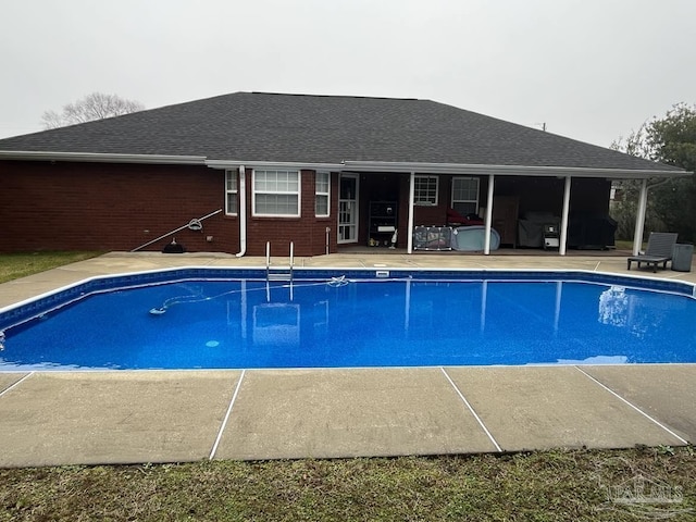 view of pool with a patio area