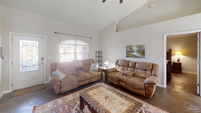 living room with ceiling fan and lofted ceiling