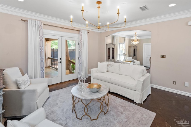 457 Boone Ln, Fairhope, AL 36532 - living room with arched walkways, a chandelier, french doors, crown molding, and baseboards