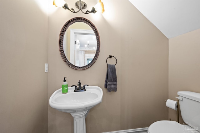 457 Boone Ln, Fairhope, AL 36532 - half bath featuring toilet and a chandelier