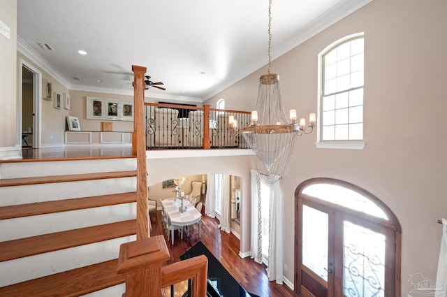 457 Boone Ln, Fairhope, AL 36532 - stairway with a chandelier, wood finished floors, ceiling fan, french doors, and crown molding