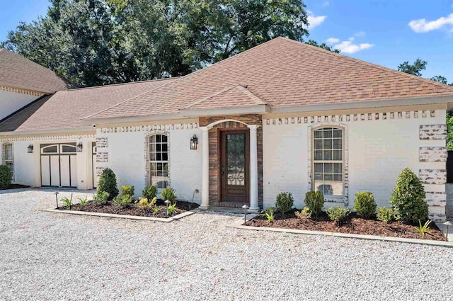 457 Boone Ln, Fairhope, AL 36532 - view of front of house with a shingled roof and brick siding