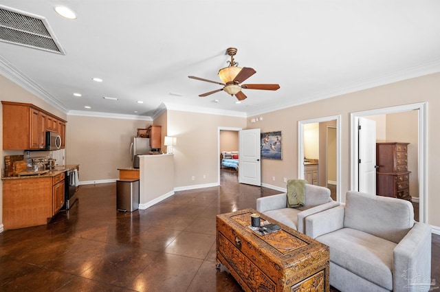 living room featuring dark tile patterned floors, crown molding, and ceiling fan