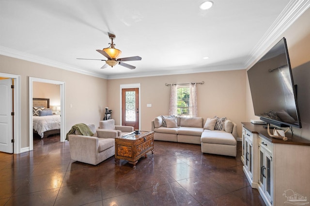 living room with ornamental molding and ceiling fan