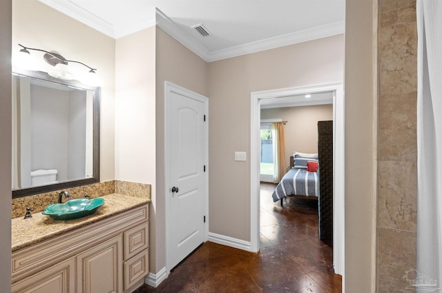 457 Boone Ln, Fairhope, AL 36532 - bathroom with crown molding, baseboards, vanity, and tile patterned flooring
