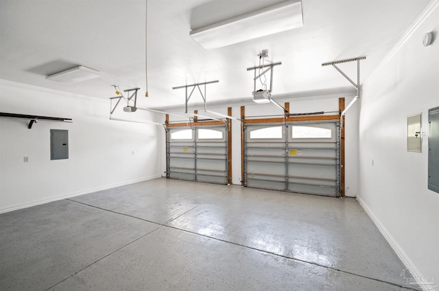 garage with a garage door opener and electric panel