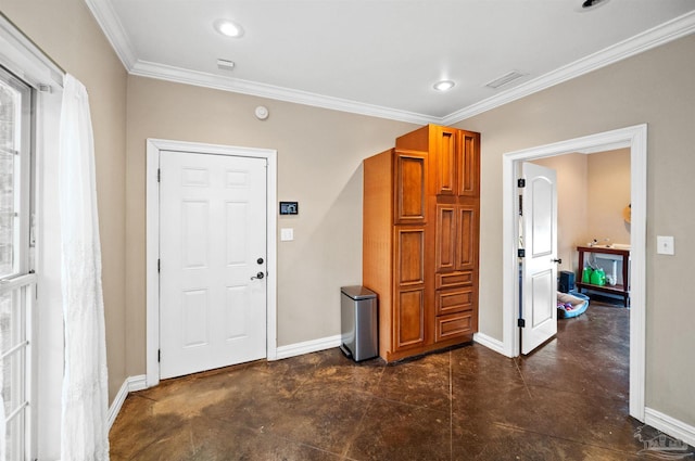 457 Boone Ln, Fairhope, AL 36532 - foyer featuring baseboards, ornamental molding, finished concrete flooring, and recessed lighting