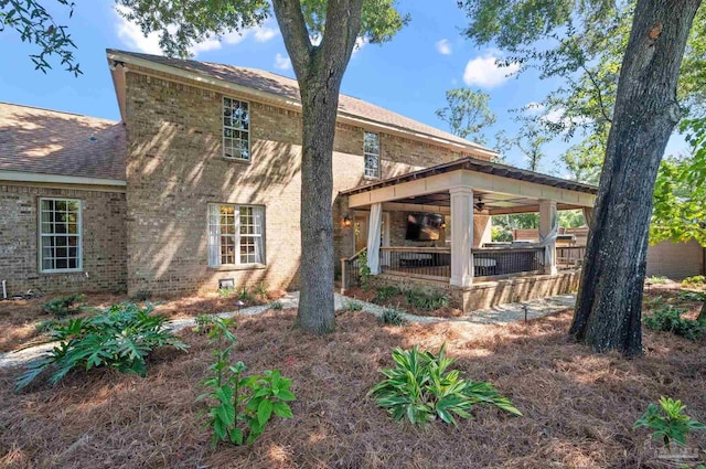 457 Boone Ln, Fairhope, AL 36532 - back of house with a ceiling fan and a shingled roof