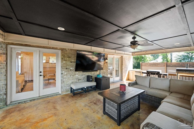 457 Boone Ln, Fairhope, AL 36532 - living area featuring french doors, unfinished concrete flooring, and ceiling fan