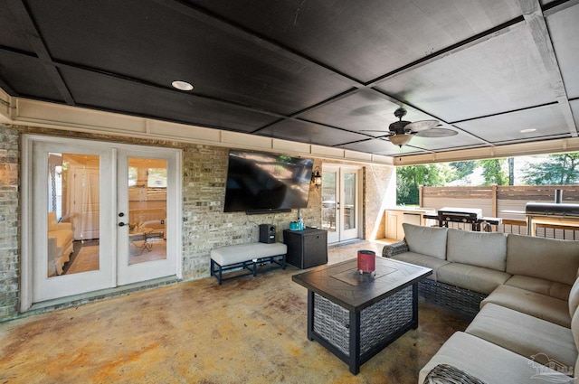 view of patio / terrace with french doors, ceiling fan, grilling area, and outdoor lounge area