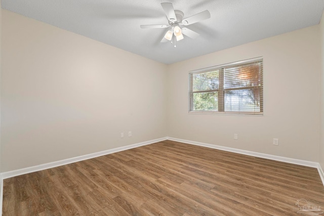 3481 Summit Blvd, Pensacola, FL 32503 - empty room with baseboards, wood finished floors, and ceiling fan