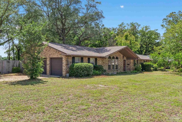 3481 Summit Blvd, Pensacola, FL 32503 - ranch-style house with an attached garage and brick siding