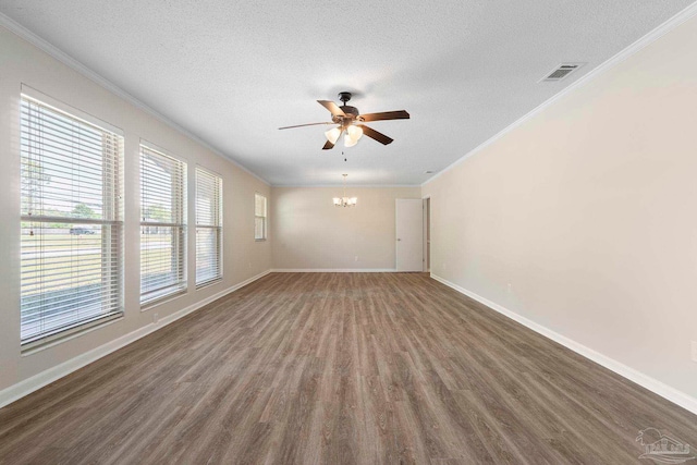 3481 Summit Blvd, Pensacola, FL 32503 - unfurnished room with crown molding, ceiling fan, wood finished floors, a textured ceiling, and baseboards