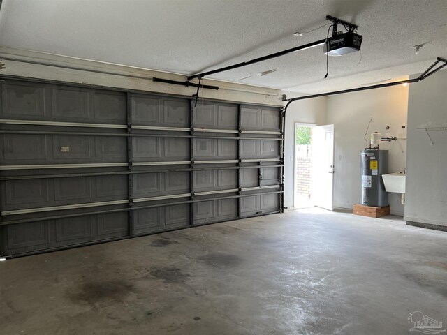 garage with water heater and a garage door opener