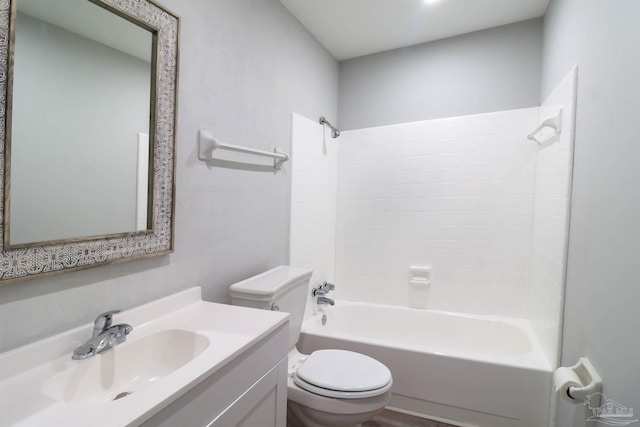 full bathroom featuring vanity, tub / shower combination, and toilet