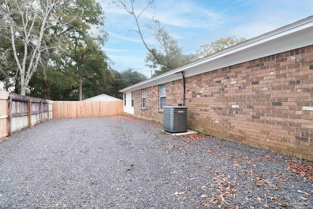 view of yard with central AC unit