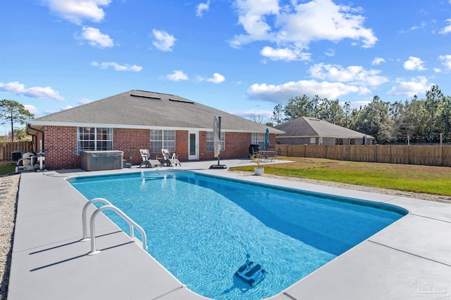 1933 Eagle Ln, Navarre, FL 32566 - view of pool with a hot tub and a patio area