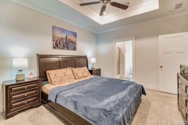 bedroom featuring light colored carpet, baseboards, visible vents, crown molding, and a tray ceiling
