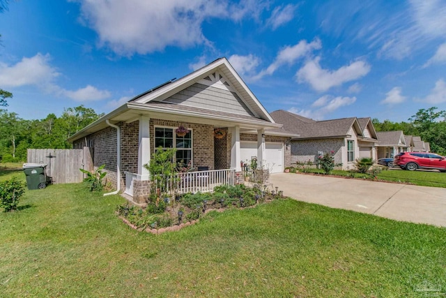 single story home featuring a porch, brick siding, driveway, a front lawn, and an attached garage