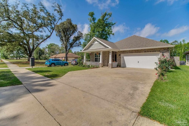 view of front of house with concrete driveway, a front lawn, an attached garage, and brick siding