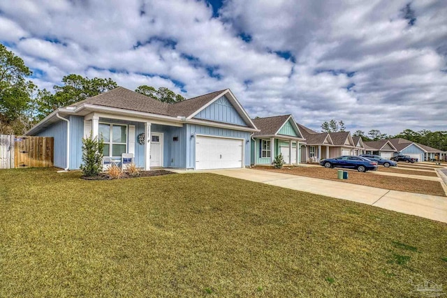 ranch-style home with a garage and a front yard