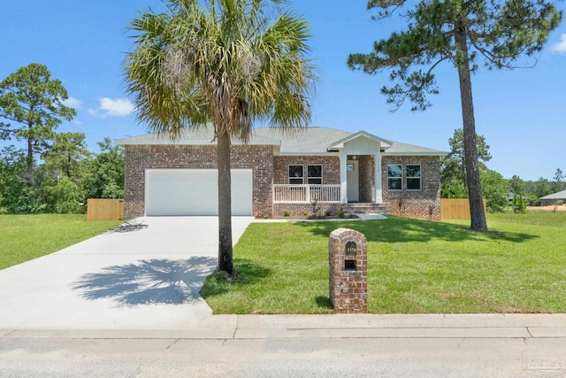 view of front of house with a front yard and a garage