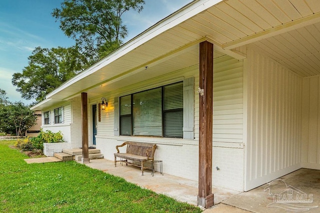 property entrance with covered porch