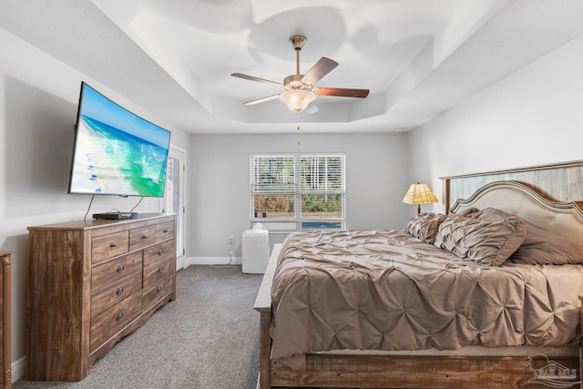 6743 Desoto St, Navarre, FL 32566 - bedroom featuring a raised ceiling, carpet flooring, baseboards, and ceiling fan