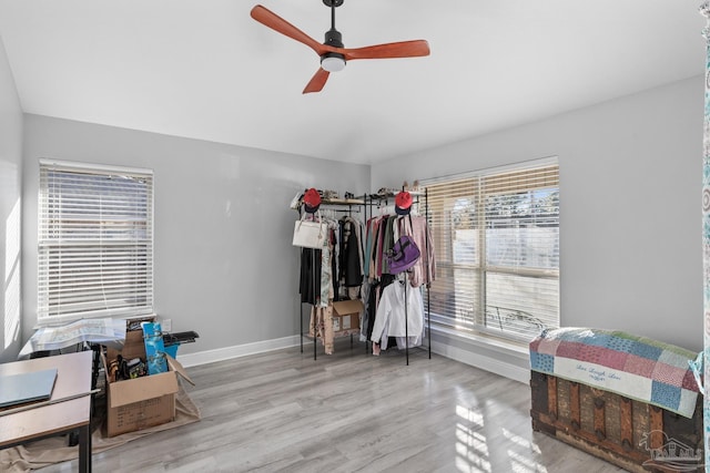 6743 Desoto St, Navarre, FL 32566 - bedroom with baseboards, wood finished floors, and ceiling fan