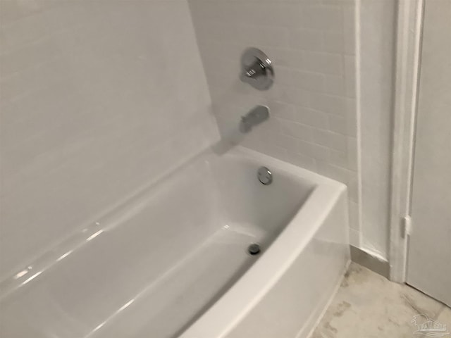 bathroom featuring a tub