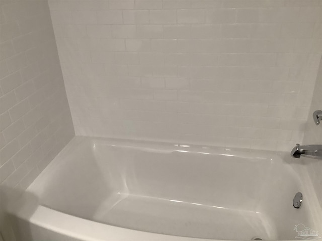 bathroom with shower / tub combination