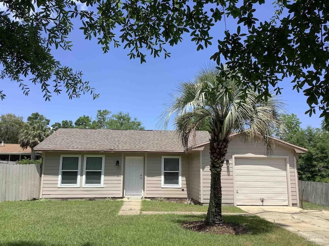 single story home with a front lawn, driveway, fence, and an attached garage