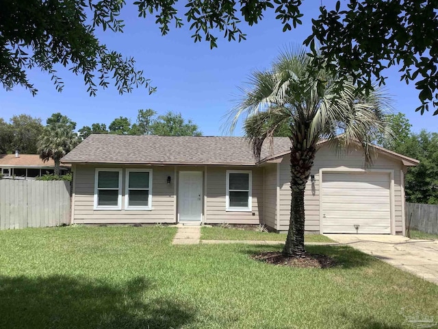 ranch-style home with roof with shingles, fence, an attached garage, concrete driveway, and a front lawn