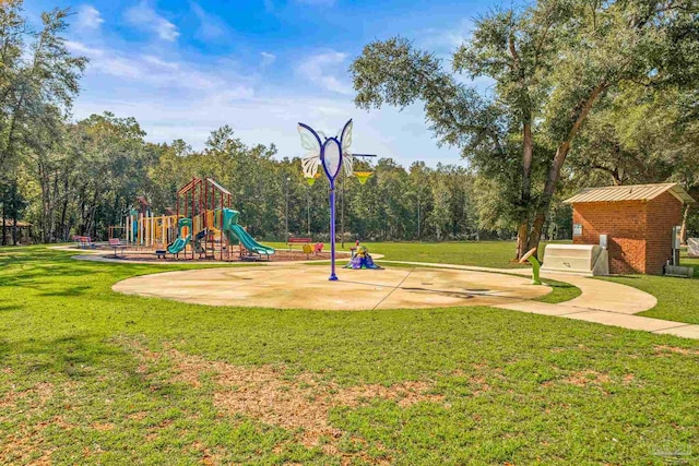 view of jungle gym with a lawn