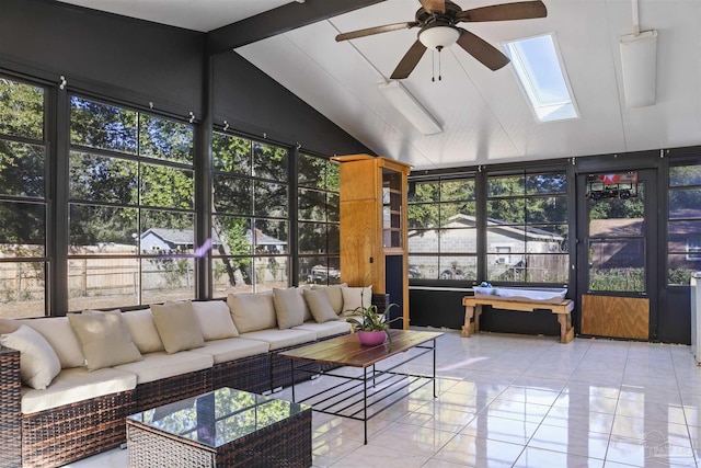 sunroom / solarium with a wealth of natural light, lofted ceiling with skylight, and ceiling fan