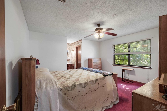 bedroom with baseboards, a textured ceiling, ceiling fan, and dark colored carpet