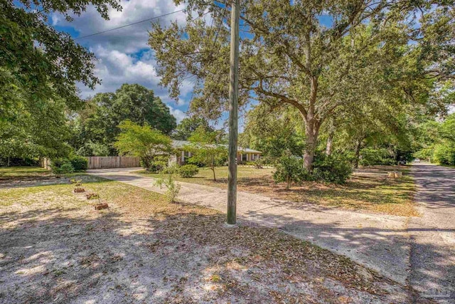 view of yard featuring fence