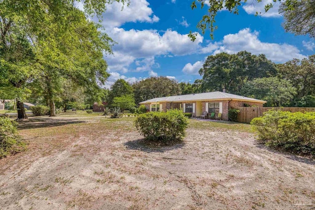 view of front of home with fence